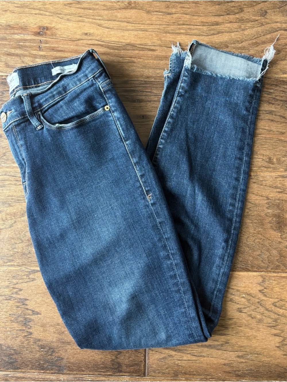 Frame Denim Dark Blue Skinny Jeans with Frayed Hem